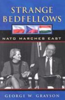 Paperback Strange Bedfellows: NATO Marches East Book