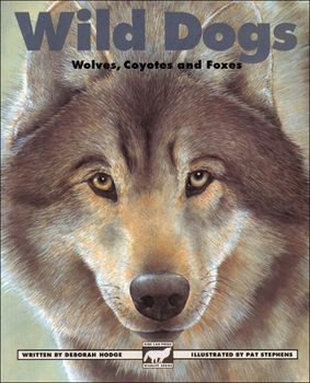 Paperback Wild Dogs: Wolves, Coyotes and Foxes Book