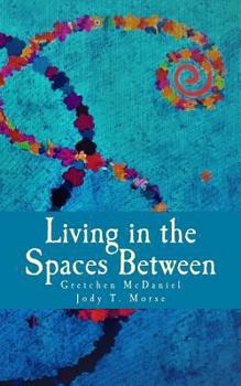 Paperback Living in the Spaces Between Book