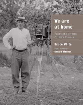 Paperback We Are at Home: Pictures of the Ojibwe People Book