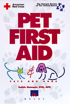 Paperback Pet First Aid: Cats & Dogs Book