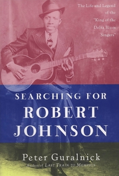Paperback Searching for Robert Johnson: The Life and Legend of the "King of the Delta Blues Singers" Book