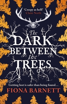 Paperback The Dark Between the Trees Book