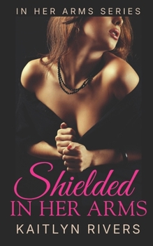 Paperback Shielded In Her Arms Book