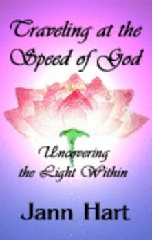 Paperback Traveling at the speed of god; uncovering the light within Book
