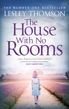 Paperback The House with No Rooms Book