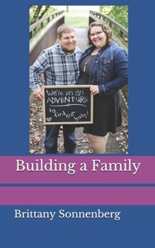 Paperback Building a Family Book