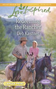 Mass Market Paperback Redeeming the Rancher [Large Print] Book