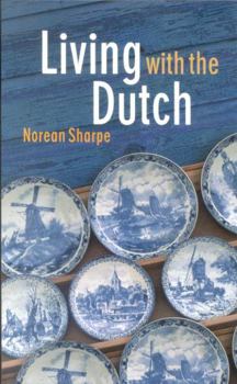 Paperback Living with the Dutch: An American Family in the Hague Book