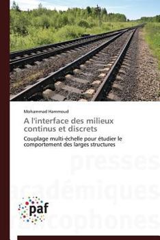 Paperback A l'Interface Des Milieux Continus Et Discrets [French] Book
