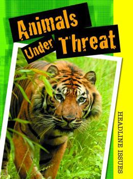 Paperback Animals Under Threat Book