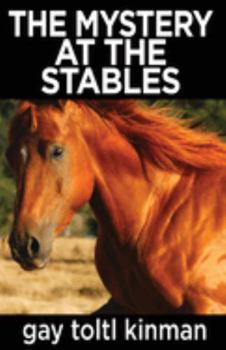 Paperback The Mystery at The Stables Book