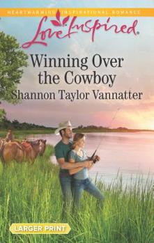 Mass Market Paperback Winning Over the Cowboy [Large Print] Book