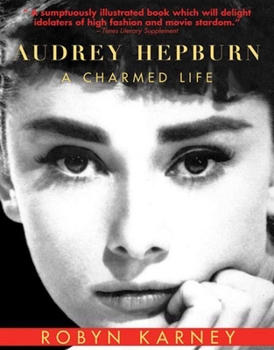 Paperback Audrey Hepburn: A Charmed Life Book