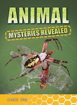 Paperback Animal Mysteries Revealed Book