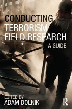 Paperback Conducting Terrorism Field Research: A Guide Book