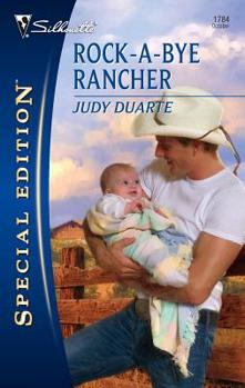 Mass Market Paperback Rock-A-Bye Rancher Book