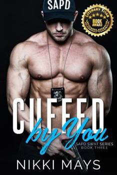 Paperback Cuffed by You Book