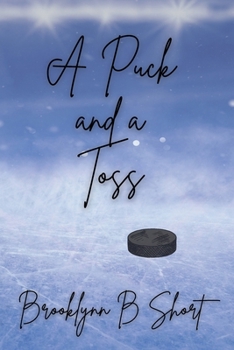 Paperback A Puck and a Toss Book