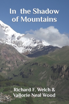 Paperback In the Shadow of Mountains Book