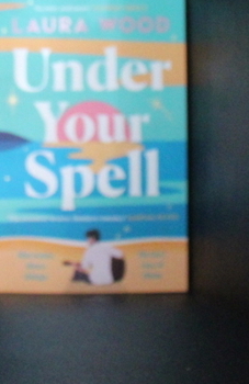 Paperback Under Your Spell Book