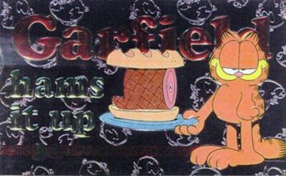 Paperback Garfield Hams It Up Book