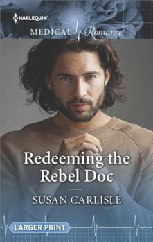 Mass Market Paperback Redeeming the Rebel Doc [Large Print] Book