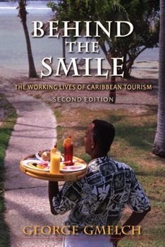 Paperback Behind the Smile : The Working Lives of Caribbean Tourism Book