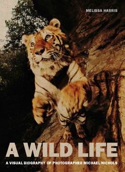 Hardcover A Wild Life: A Visual Biography of Photographer Michael Nichols Book