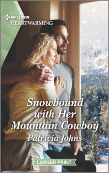 Mass Market Paperback Snowbound with Her Mountain Cowboy [Large Print] Book