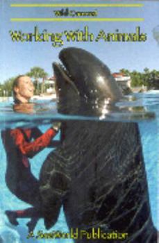 Paperback Working with animals (Sea World education series) Book