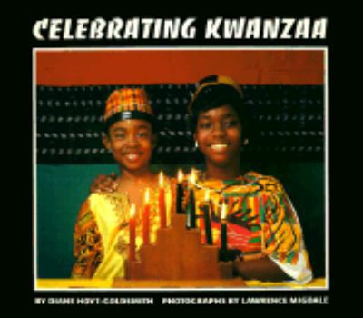 Paperback Celebrating Kwanzaa Book