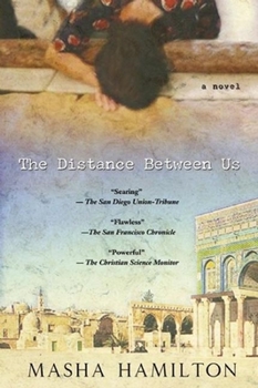 Paperback The Distance Between Us Book