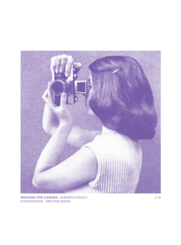 Paperback Holding the Camera Book