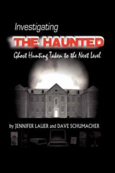 Paperback Investigating the Haunted Book