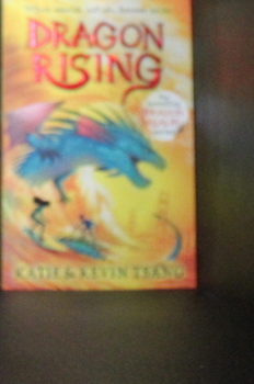 Paperback Dragon Rising: Dragon Realm Book