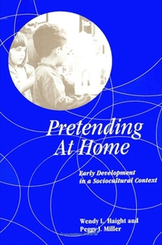 Paperback Pretending at Home: Early Development in a Sociocultural Context Book