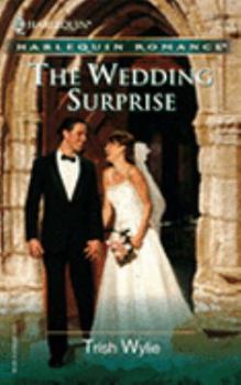 Paperback THE WEDDING SURPRISE Book