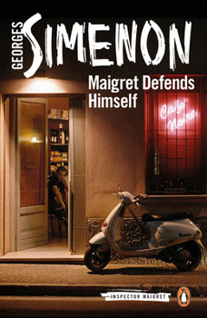 Paperback Maigret Defends Himself Book