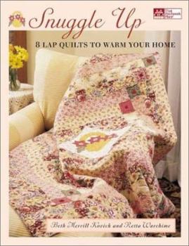 Paperback Snuggle Up: 8 Lap Quilts to Warm Your Home Book