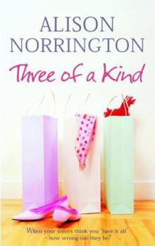 Paperback Three of a Kind Book