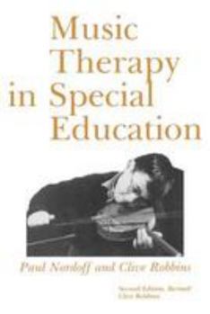Paperback Music Therapy in Special Education Book