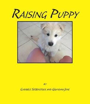 Paperback Raising Puppy Book