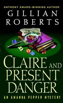 Paperback Claire and Present Danger (An Amanda Pepper Mystery) Book