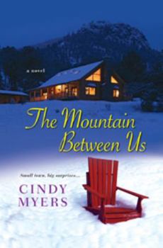 Paperback The Mountain Between Us Book