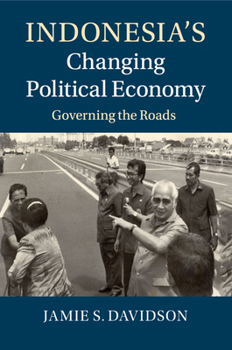 Paperback Indonesia's Changing Political Economy: Governing the Roads Book