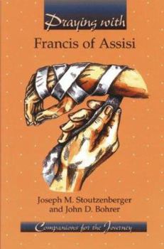 Paperback Praying with Francis of Assisi Book