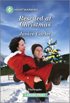 Mass Market Paperback Rescued at Christmas: A Clean and Uplifting Romance [Large Print] Book