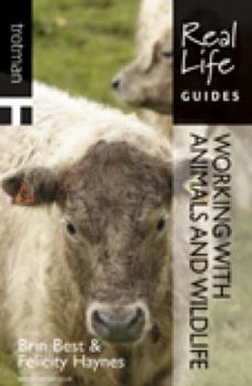 Paperback Real Life Guide: Working with Animals and Wildlife Book