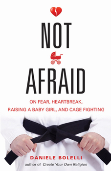 Paperback Not Afraid: On Fear, Heartbreak, Raising a Baby Girl, and Cage Fighting Book